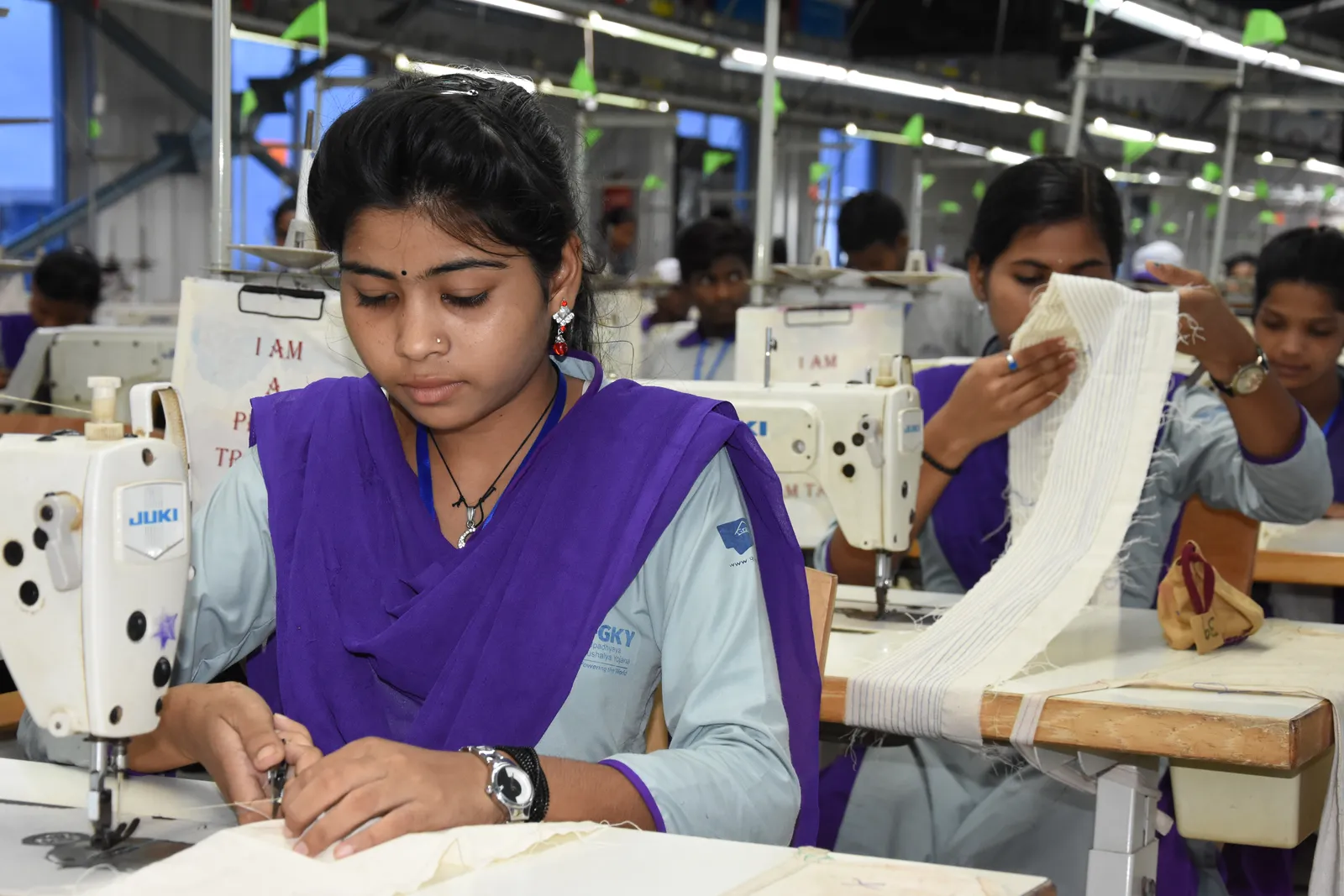 A live garment production line run by trainees